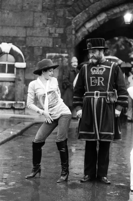 Framed Print : Beefeater Rory Crozier looks on with disbelief as disco dancer Lucia Catti (18 Framed Print : Beefeater Rory Crozier looks on with disbelief as disco dancer Lucia Catti (18