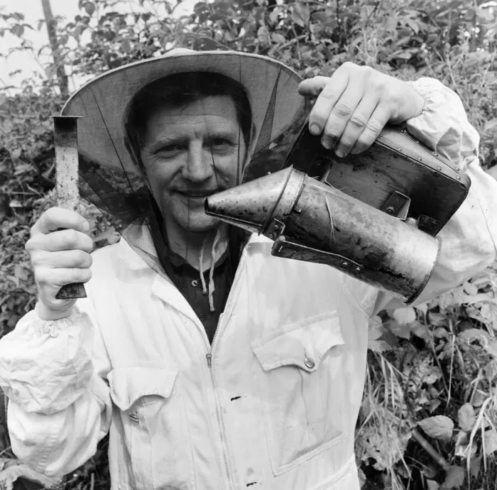 Framed Print : Beekeeper, G Baitey, holding Smoker with heat shield and hook, Newcastle, 22nd July 1971 Framed Print : Beekeeper, G Baitey, holding Smoker with heat shield and hook, Newcastle, 22nd July 1971