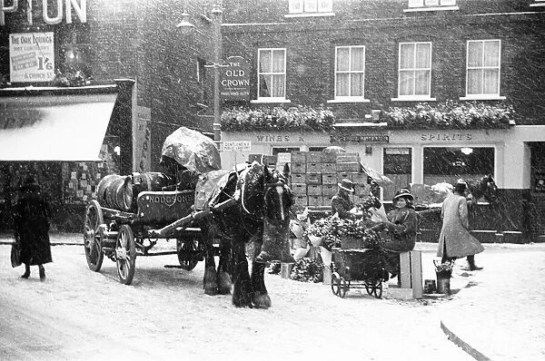 Beer delivery in the snow to The Old Crown public house in Union Street in Kingston Upon