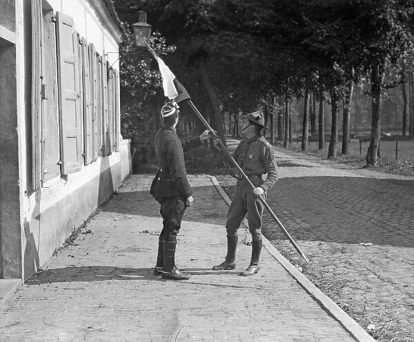 Belgian boy scout with a lance he captured from a German Uhlan soldier he had shot
