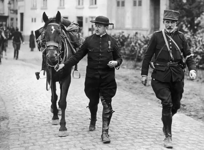 Framed Print : Belgian priest decorated for his bravery is seen here with a cavalry officer following Framed Print : Belgian priest decorated for his bravery is seen here with a cavalry officer following