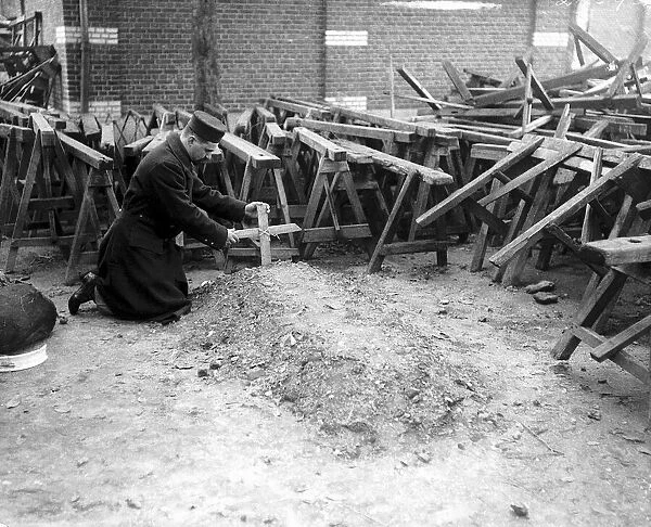 This Belgian soldier was given the job of making wooden crosses to mark the graves of his