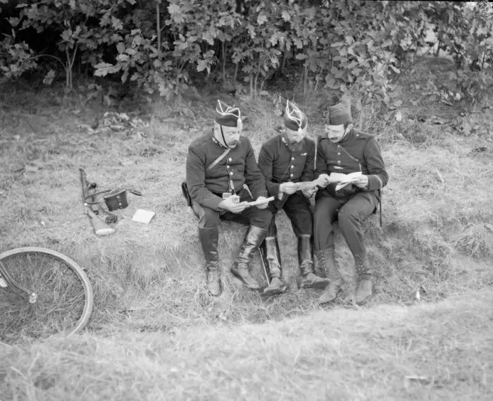 Framed Print : Belgian soldiers consort their maps as the German army advances through Belgium Framed Print : Belgian soldiers consort their maps as the German army advances through Belgium