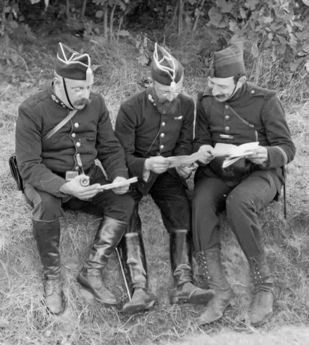 Framed Print : Belgian soldiers consort their maps as the German army advances through Belgium Framed Print : Belgian soldiers consort their maps as the German army advances through Belgium