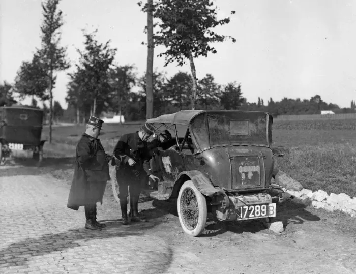 Framed Print : Belgium officers inspect a staff car which had been captured by the Germans along with Framed Print : Belgium officers inspect a staff car which had been captured by the Germans along with