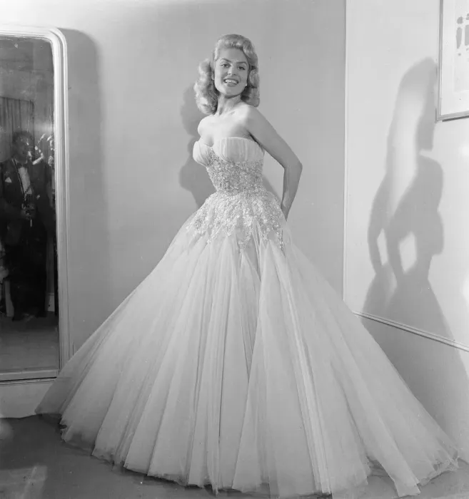 Framed Print : Belinda Lee, British actress tries on dress designed by Julie Harris Framed Print : Belinda Lee, British actress tries on dress designed by Julie Harris