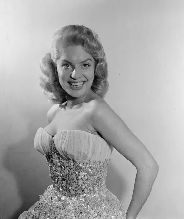 Framed Print : Belinda Lee, British actress tries on dress designed by Julie Harris Framed Print : Belinda Lee, British actress tries on dress designed by Julie Harris