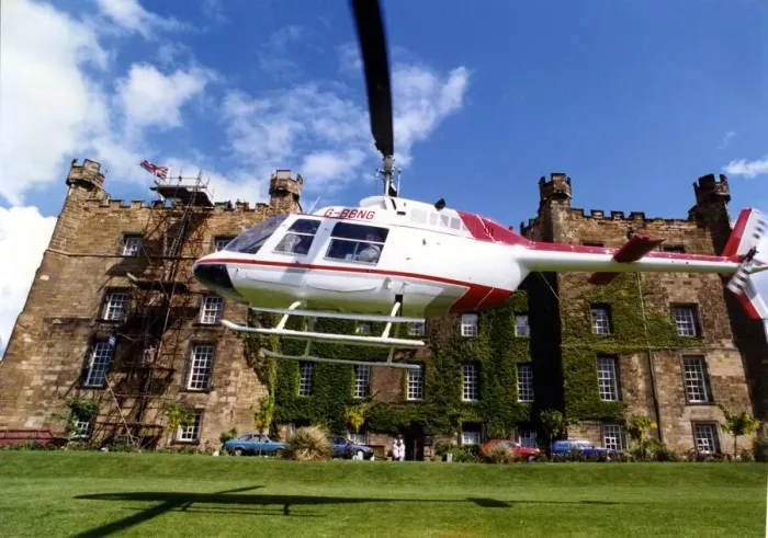 Framed Print : A Bell Jet Ranger helicopter lands at Lumley Castle, Chester-le Street Framed Print : A Bell Jet Ranger helicopter lands at Lumley Castle, Chester-le Street