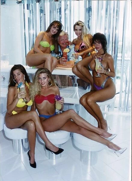 Benny Hill Actor Comedian With His Hills Angels In Their Bikinis Drinking Cocktails