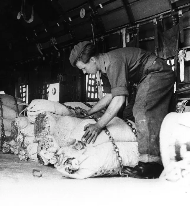 Framed Print : Berlin Air Lift 1948 A British soldier helps load goods onto a Dakota aircraft Framed Print : Berlin Air Lift 1948 A British soldier helps load goods onto a Dakota aircraft