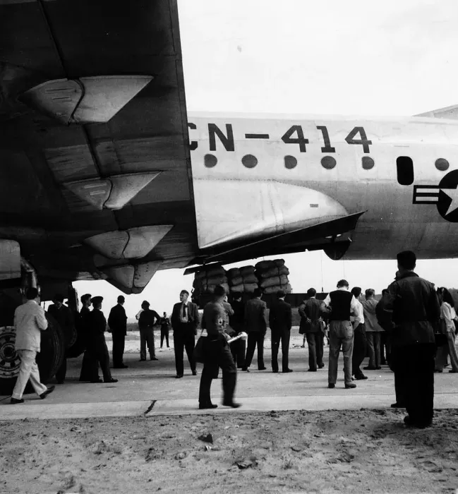 Framed Print : Berlin Airlift Circa 1948 A aircraft from the American Airforce unloads Framed Print : Berlin Airlift Circa 1948 A aircraft from the American Airforce unloads