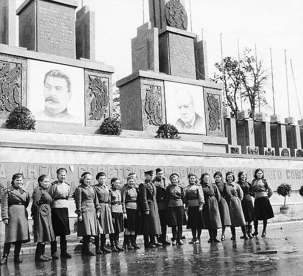 Berlin after WW2 Russian soldiers men and women at the saluting base in the Tiergarten