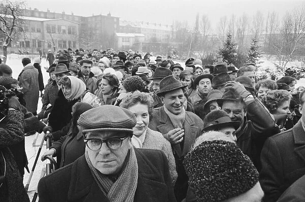 Berliners waiting to cross the wall. December 1963