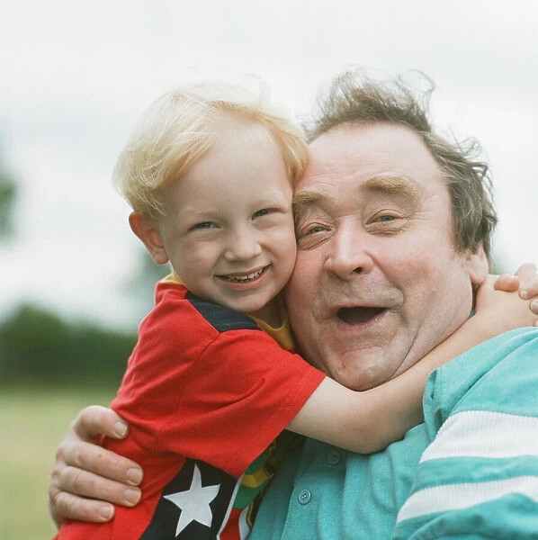 Bernard Manning plays with his Grandson 6th July 1993