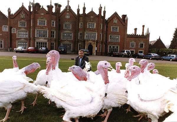 Bernard Matthews of Matthews Turkeys on the lawn outside his Mansion in Norfolk with