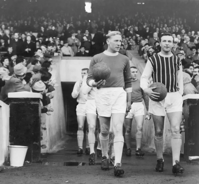Framed Print : Bert Trautmann leads out the combined Manchester City and Manchester United team against Framed Print : Bert Trautmann leads out the combined Manchester City and Manchester United team against