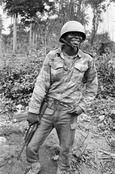 Framed Print : A Biafran soldier seen here in relaxed mood, armed with an AK47 semi automatic rifle Framed Print : A Biafran soldier seen here in relaxed mood, armed with an AK47 semi automatic rifle