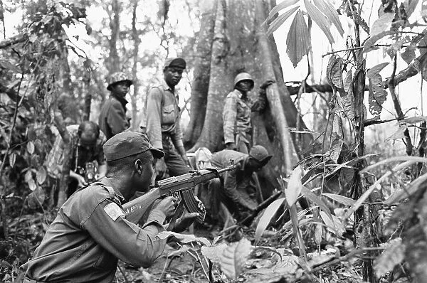 Biafran soldiers seen here advancing through the jungle towards the Nigerian army