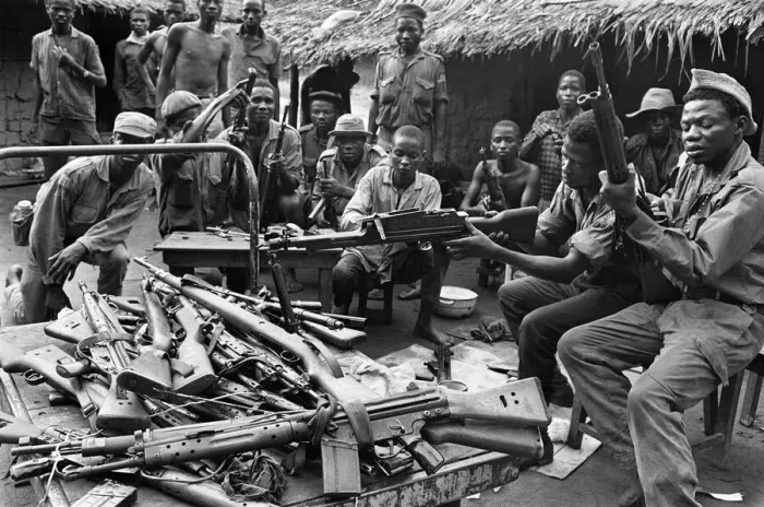 Framed Print : Biafran soldiers seen here testing out a large stockpile of weapons during the conflict Framed Print : Biafran soldiers seen here testing out a large stockpile of weapons during the conflict