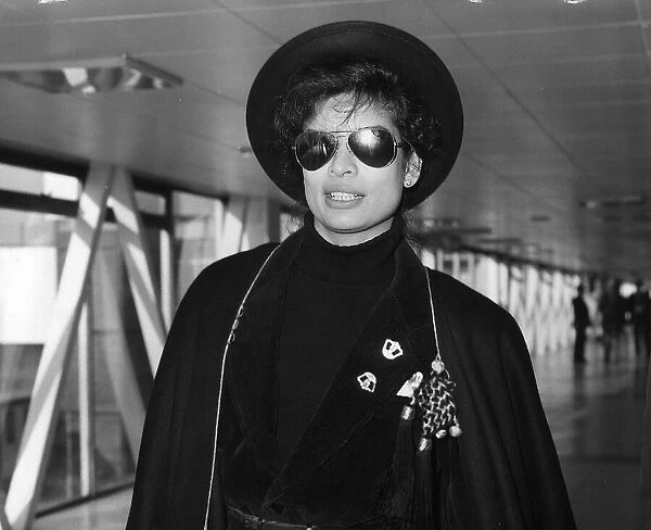 Bianca Jagger wife of Mick Jagger leaving London Airport for New York on Concorde 1978