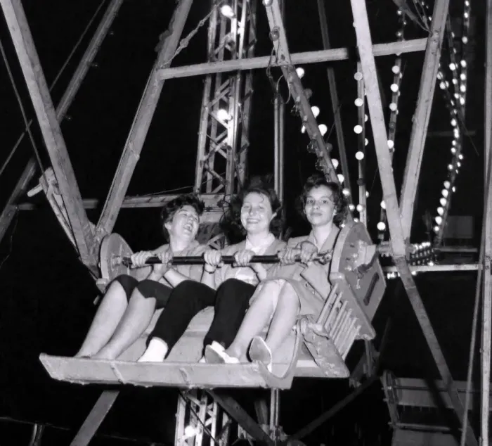 Framed Print : As the big Wheel turns, these three ladies can y help but smile Framed Print : As the big Wheel turns, these three ladies can y help but smile