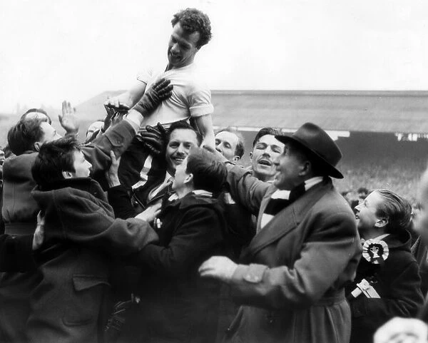 Billy Bingham is chaired off the pitch following the FA cup semi final replay between
