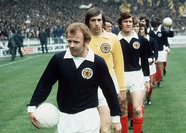 Billy Bremner 1973 Scotland leading out team holding ball