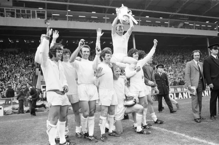 Framed Print : Billy Bremner Leeds United captain is lifted by his team mates with the F. A Framed Print : Billy Bremner Leeds United captain is lifted by his team mates with the F. A