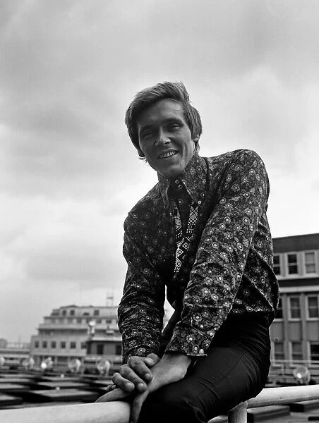 Billy Fury wearing a flowered shirt on the roof of the Daily Mirror building