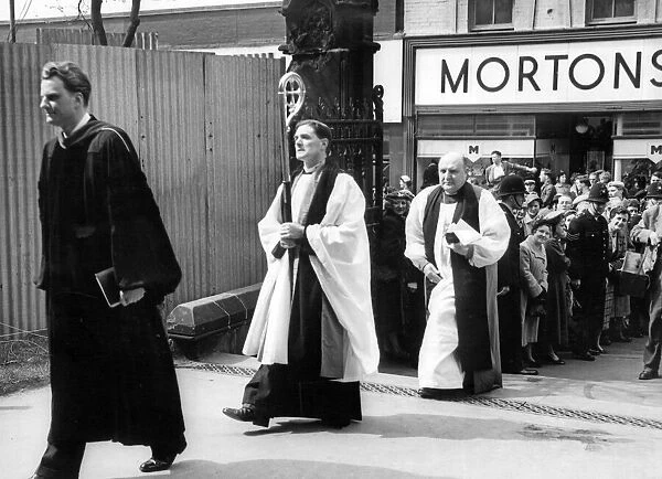 Billy Graham and the Bishop of Birmingham, Dr. Wilson, arriving at St Martin in the Bull