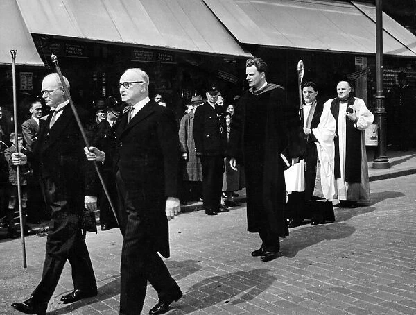 Billy Graham leaves Woolworths stores in the Bull Ring, Birmingham