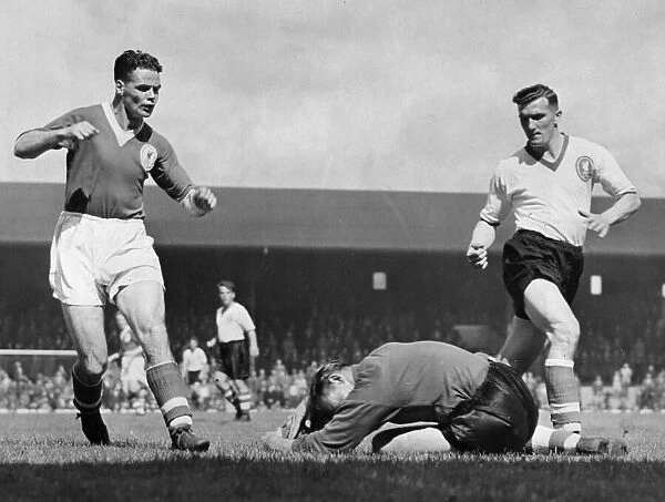 Billy Liddell in action during a Liverpool FC trial match. 11th August 1956