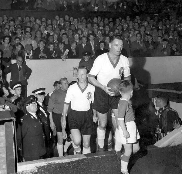 Billy Liddell leads out the stars for his testimonial match at Anfield