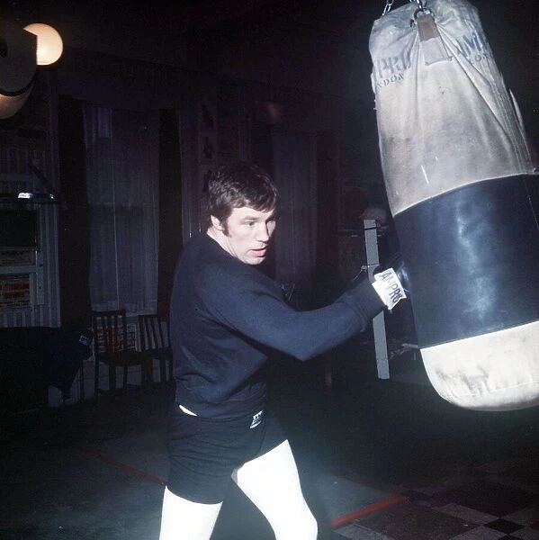 Billy Walker Boxer March 1969 Training in Battersea  /  punchbag  /  boxing