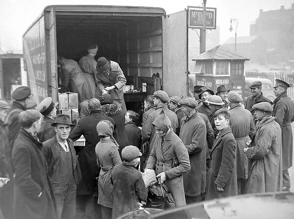 Birmingham Blitz 1940 People buying rationed goods from the back of van parked in