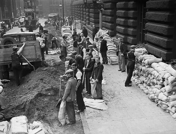 Birmingham City Council workmen seen here filling and sandbagging the City