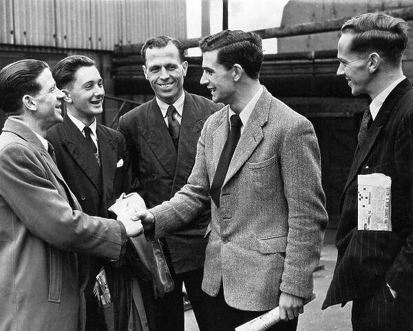 Birmingham City footballer Eddie Brown (right) greets some of his new colleagues at St