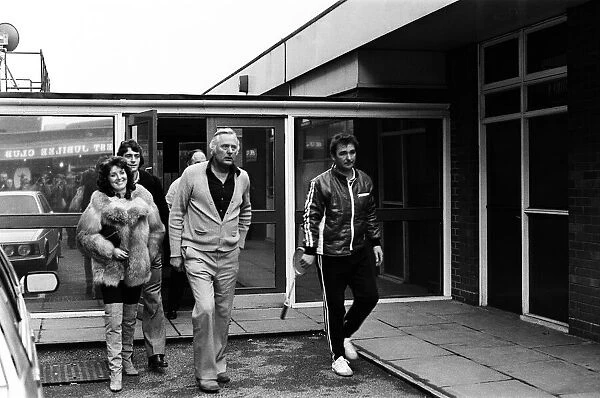 Former Birmingham City footballer Trevor Francis with his wife accompanied by his new