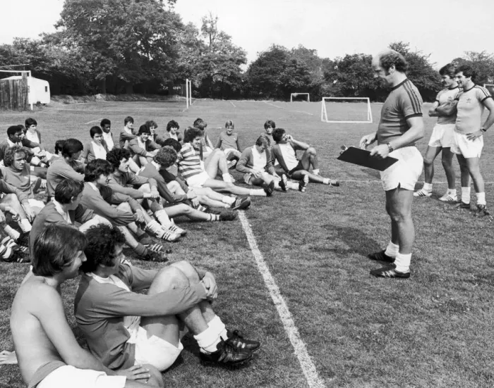 Framed Print : Birmingham City players listen to instructions from manager Jim Smith during a pre season Framed Print : Birmingham City players listen to instructions from manager Jim Smith during a pre season