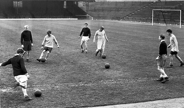 Birmingham City training. Players with coach Ray Shaw practicing their passing skills