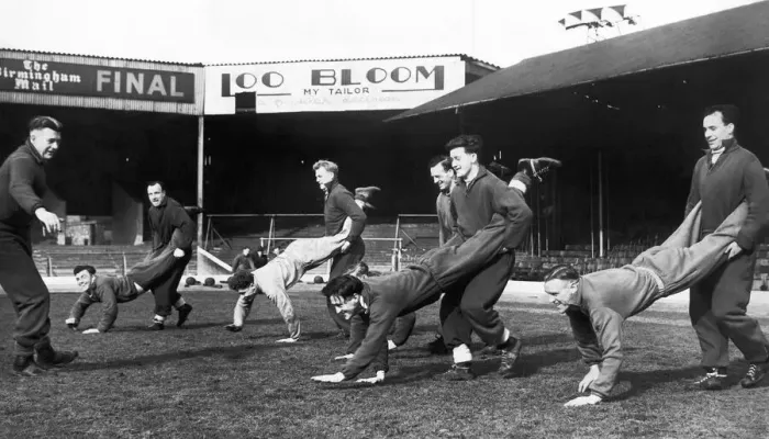 Framed Print : Birmingham City training. RTrainer Ray Shaw has the players performing the wheelbarrow Framed Print : Birmingham City training. RTrainer Ray Shaw has the players performing the wheelbarrow
