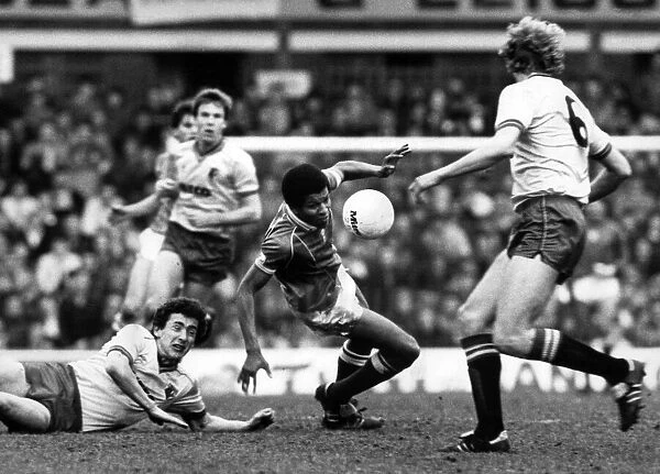 Birmingham Citys Howard Gayle loses his way and takes a tumble watched by Rostron