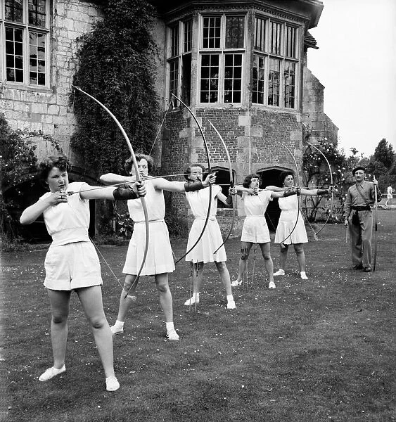Bisham Abbey Physical recreation centre. A group of women on the lawns in front of