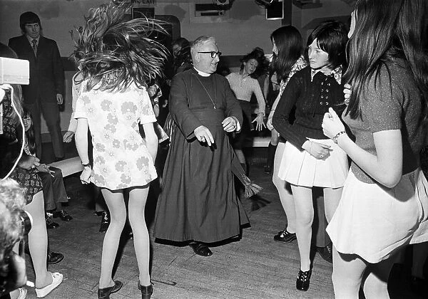 The Bishop of Durham, Dr. Ian Ramsey, dancing with fifteen-year-old Isobel Brennan