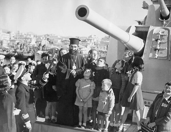 The Bishop of Piraeus with Commander Foster-Brown of the Royal Navy pictured with a group