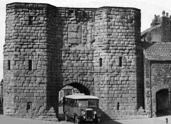 Framed Print : A bit of ancient Alnwick, this great stone gateway guards the main road into the town Framed Print : A bit of ancient Alnwick, this great stone gateway guards the main road into the town