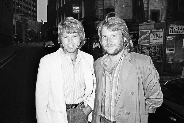 Bjorn Ulvaeus and Benny Andersson of Swedish pop group ABBA leave their Drury Lane hotel