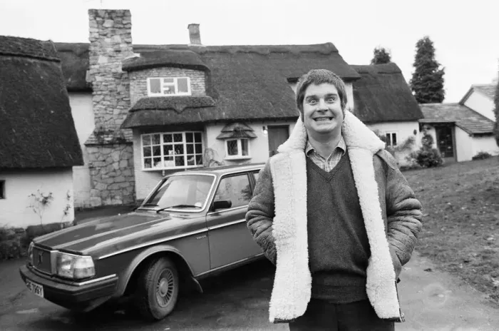 Framed Print : Black Sabbath singer Ozzy Osbourne pictured outside his new house, beside his Volvo car Framed Print : Black Sabbath singer Ozzy Osbourne pictured outside his new house, beside his Volvo car