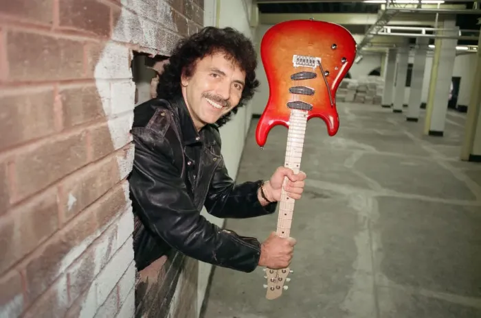 Framed Print : Black Sabbaths Tony Iommi helps to demolish a wall at Musical Exchanges in