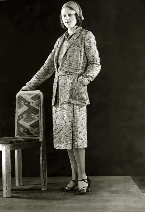 Framed Print : Black and Yellow flecked tweed sports suit - March 1931 The jumper is of yellow